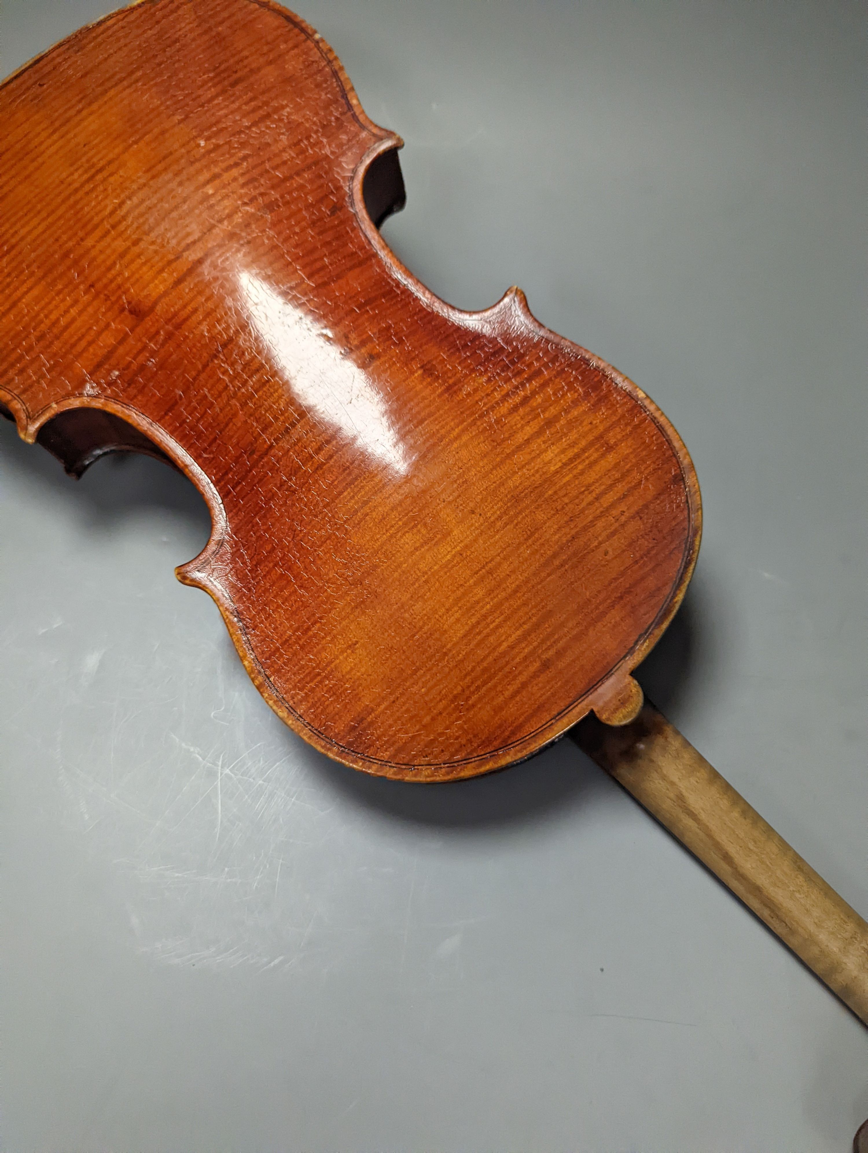 A violin in a mahogany case, case makers, Withers and sons, case 79 cms high.